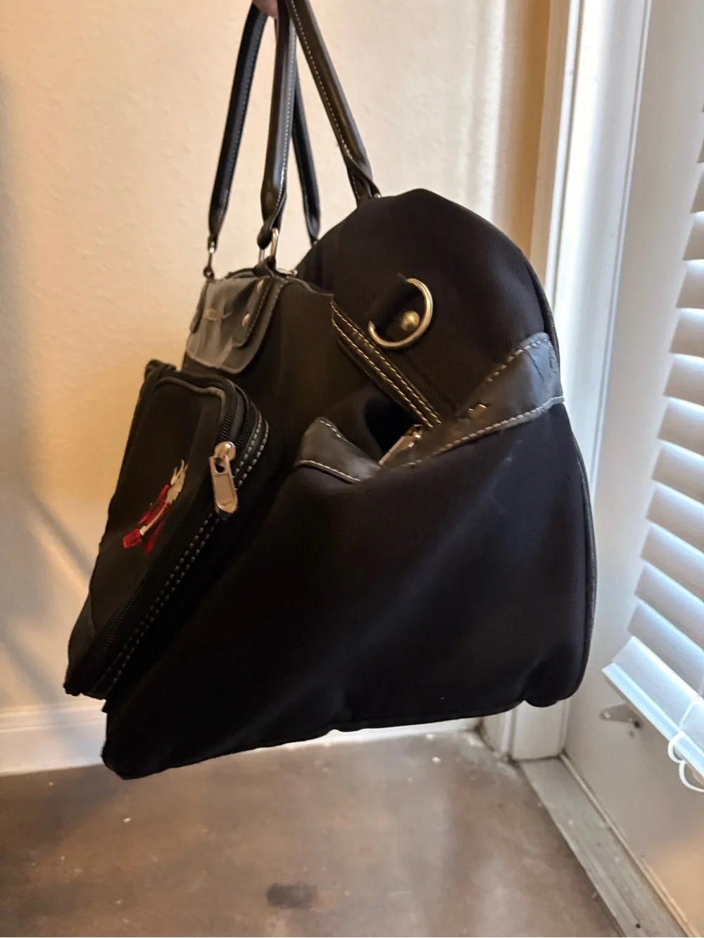 Nike Black Duffel Bag with Red Logo Accent